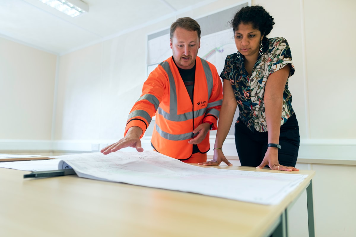Young workers in a construction training environment, representing efforts to expand the labor pipeline amid ongoing workforce shortages.