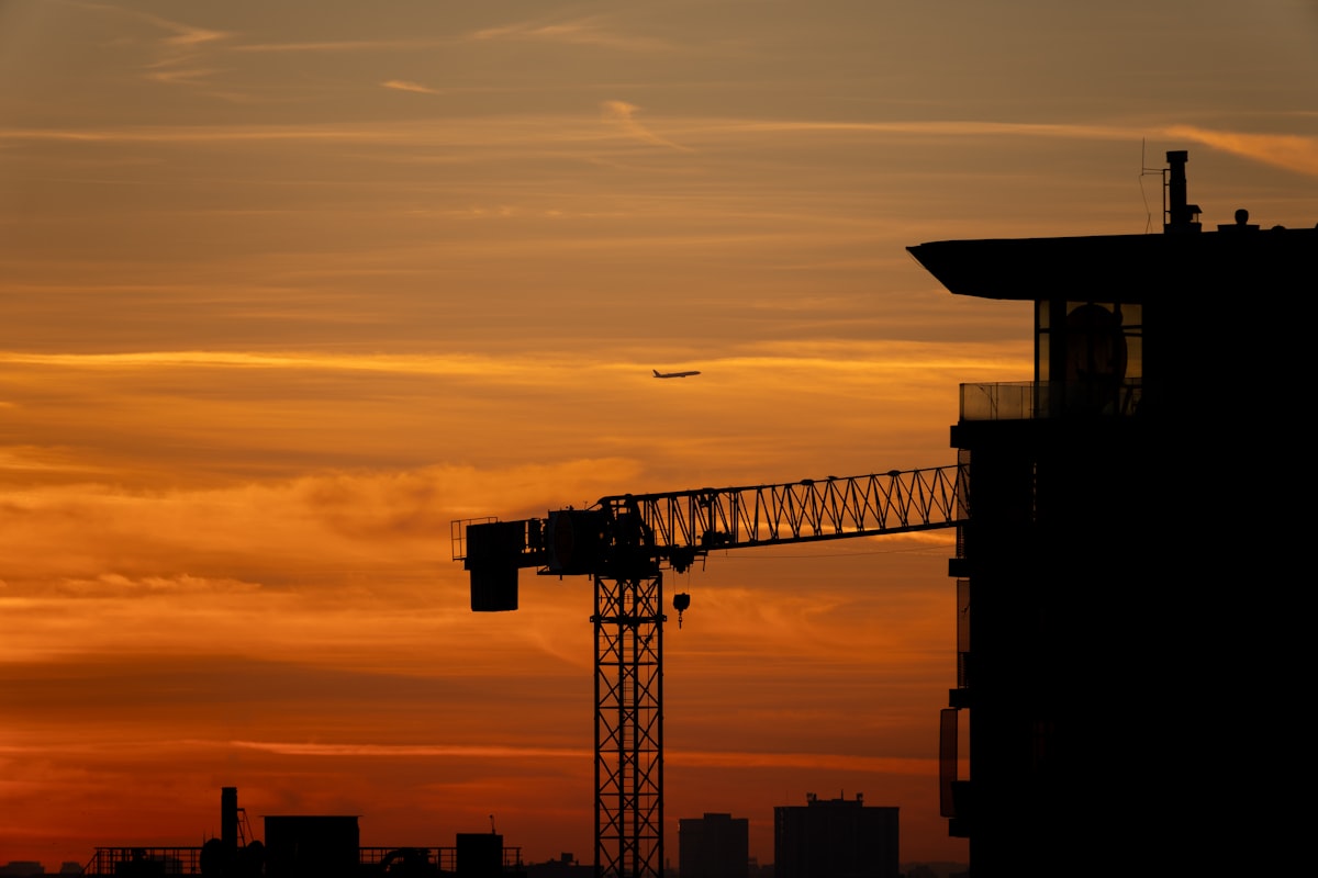 Large data center construction project with cranes, representing the sector driving contractor backlog growth in March 2026.