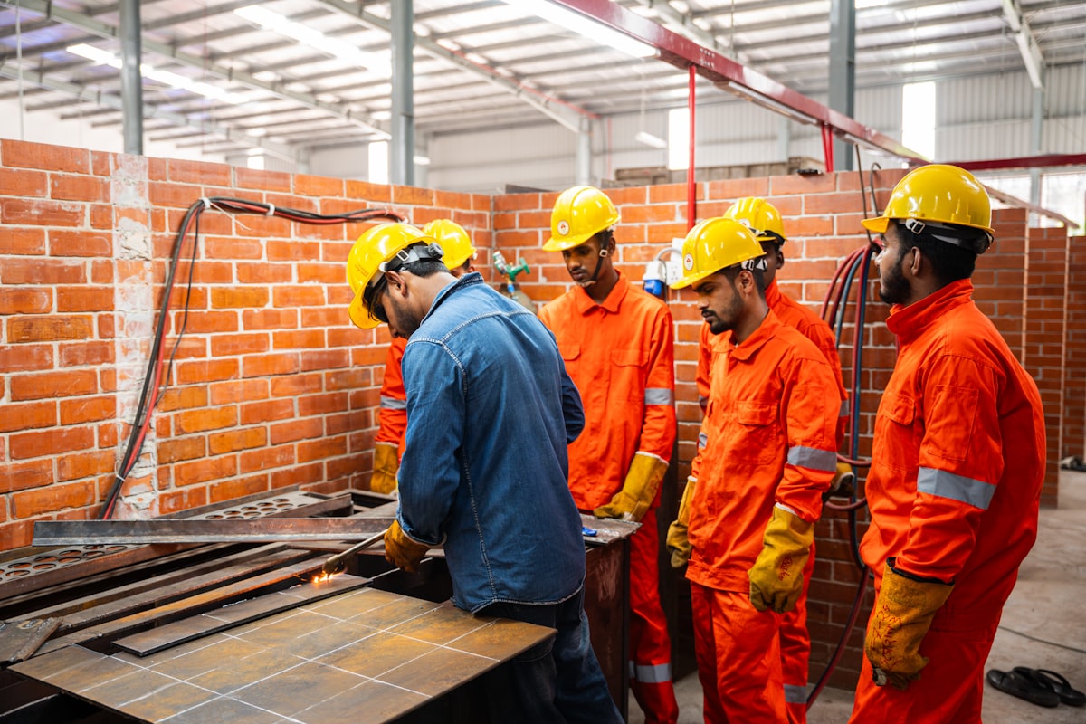 A GC estimating team reviewing subcontractor records and trade coverage across multiple active bids.