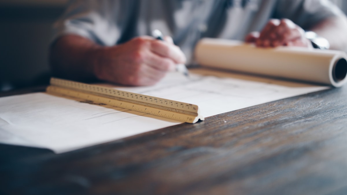 A GC estimator reviewing bid history and win-rate data to diagnose weaknesses in their preconstruction process.