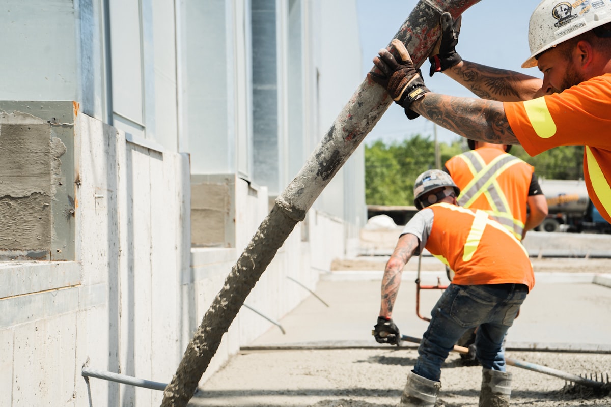 Construction crew on a nonresidential job site, representing April's hiring gains in commercial and industrial sectors.
