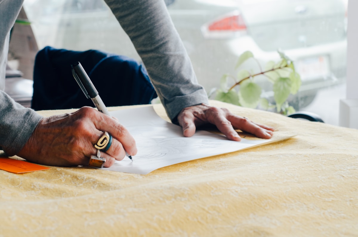 A general contractor estimator reviewing subcontractor financial documents before awarding a project scope.