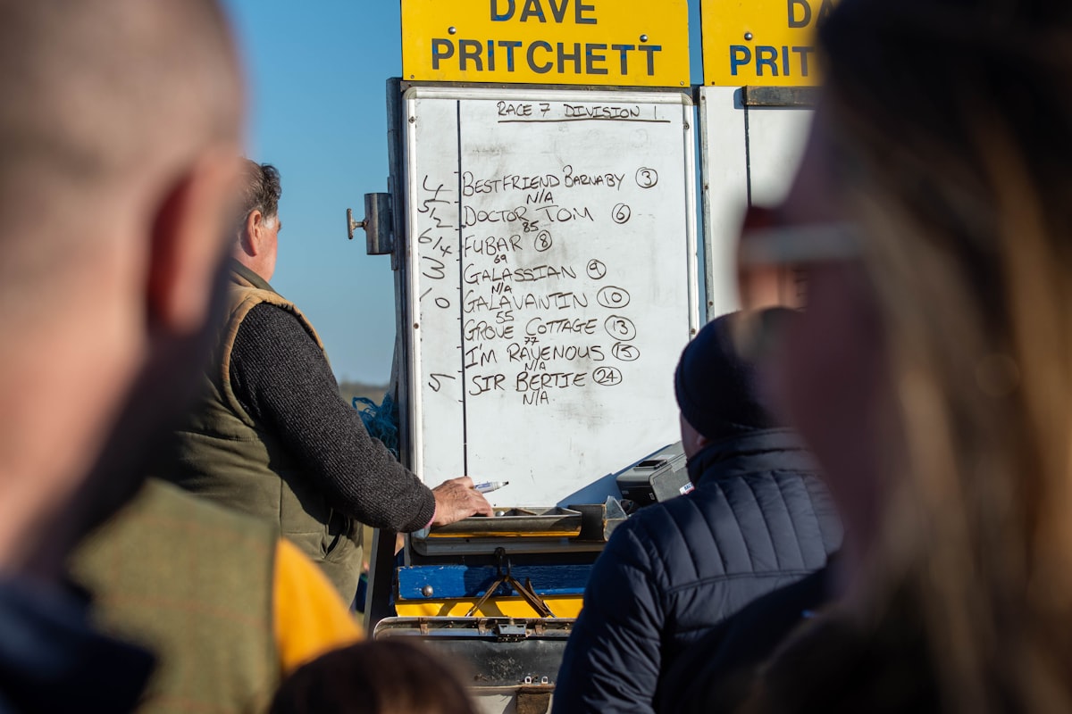 Construction crew gathered for a morning safety briefing before starting fieldwork.