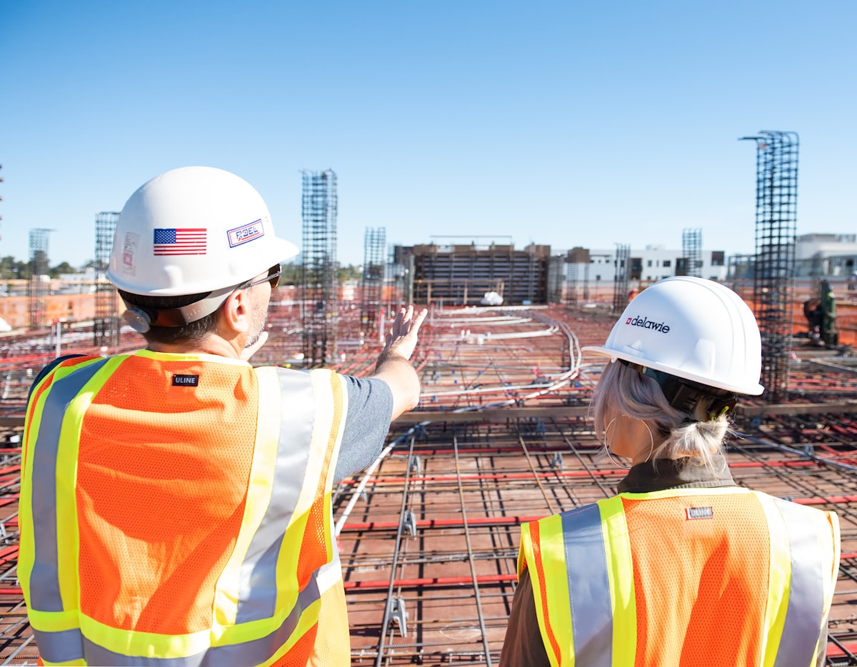 A GC estimator meeting with a trusted subcontractor to review scope on an active project bid.