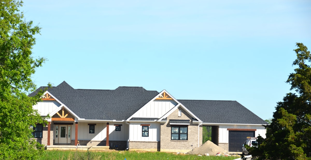 Wood framing on a single-family residential construction site, reflecting the April 2026 uptick in private residential spending.