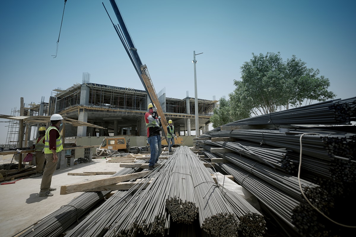 Nonresidential construction crew on an active job site, reflecting May's hiring gains across commercial and industrial sectors.